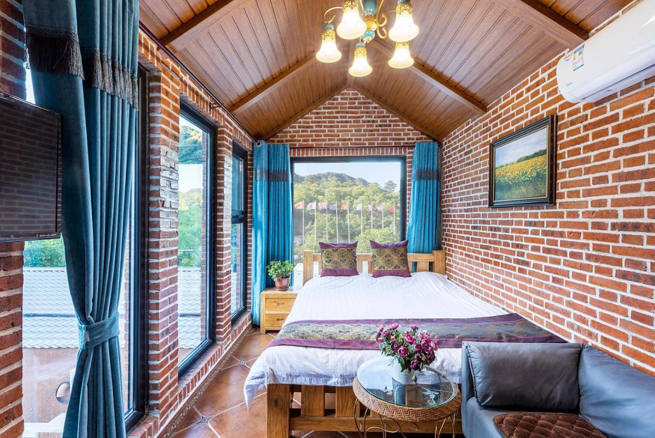 הואירו Beijing Mutianyu Great Wall Wangshanyuan Homestay מראה חיצוני תמונה